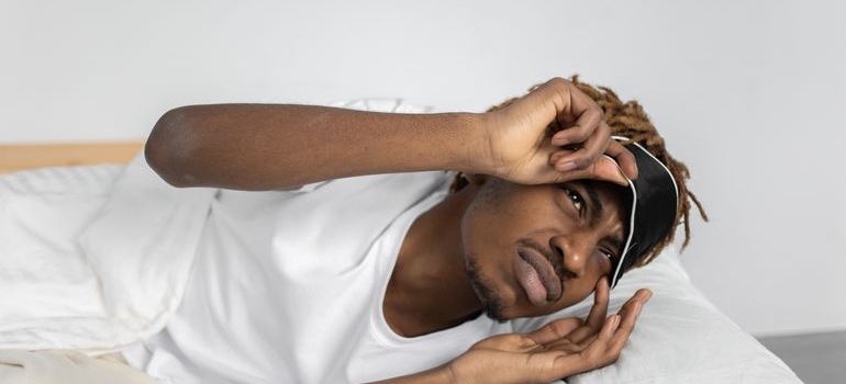 A man experiencing how addiction affect sleep during recovery